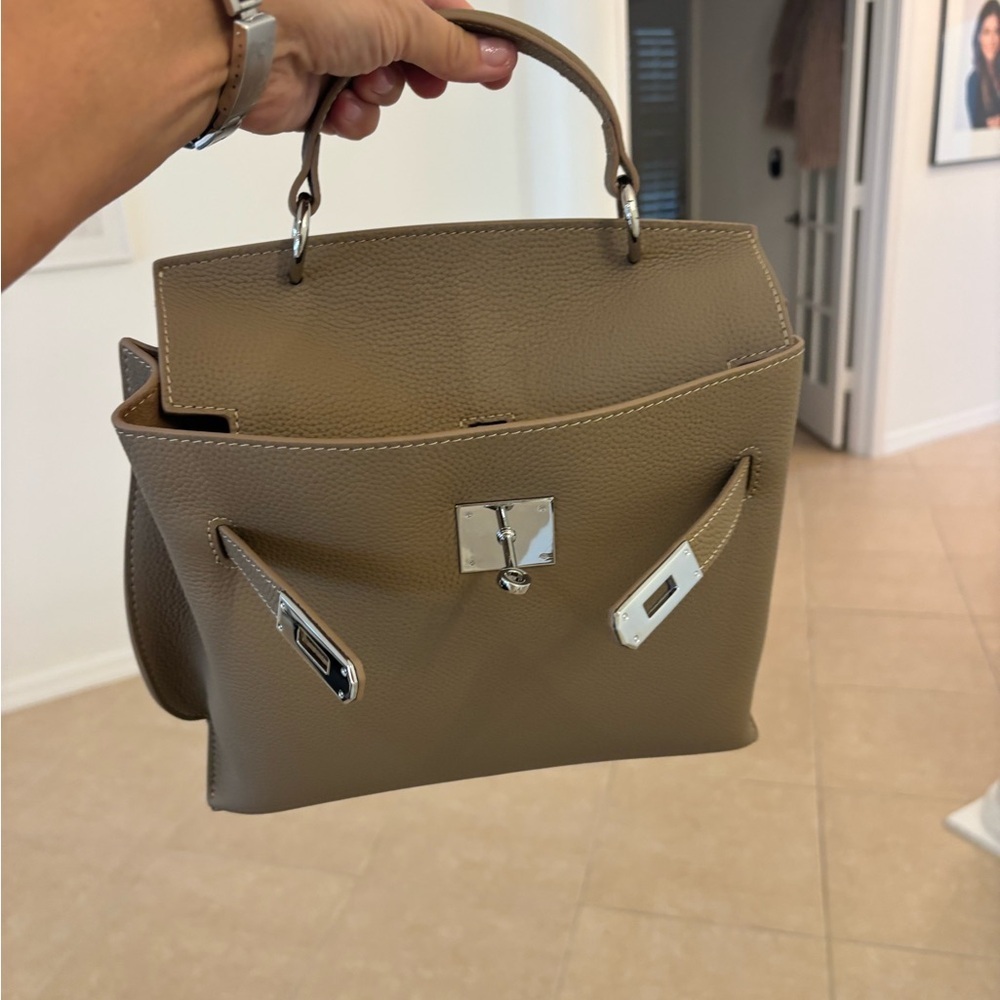Elegant Tan Leather Handbag Silver Bag .